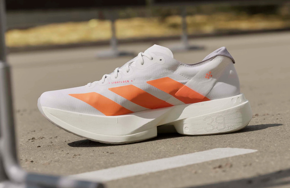 Buty Adidas Adizero Adios Pro 4 biało-pomarańczowo męskie SS26
