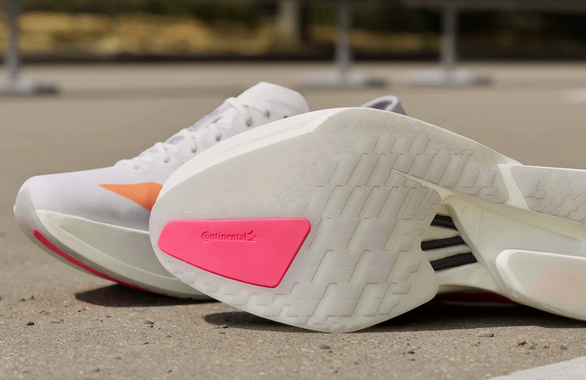 Buty Adidas Adizero Adios Pro 4 biało-pomarańczowo męskie SS26